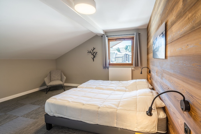 Imagen de la habitación del Hotel Vacanc&eacute;ole - Les Ecrins d\'Auris. Foto 10