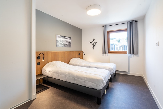 Imagen de la habitación del Hotel Vacanc&eacute;ole - Les Ecrins d\'Auris. Foto 14