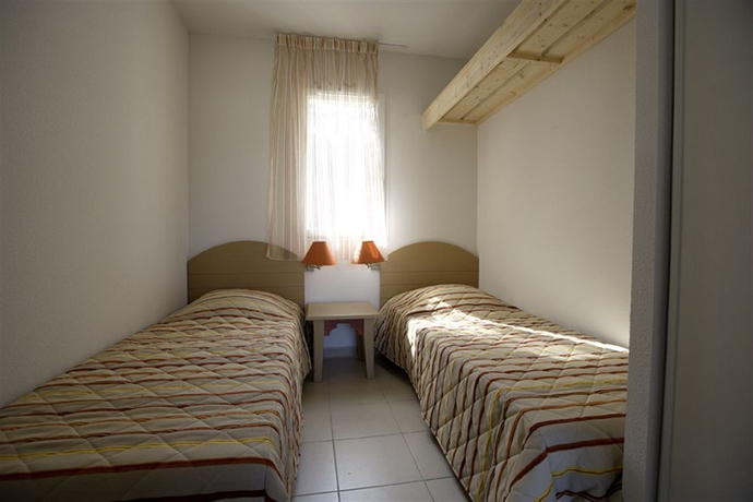 Imagen de la habitación del Hotel Vacanc&eacute;ole &ndash; L'all&eacute;e Des Dunes &ndash; Ondres Plage. Foto 4