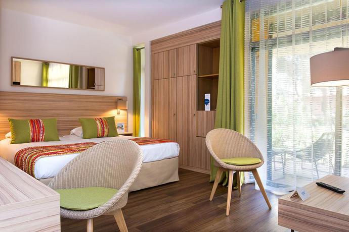 Imagen de la habitación del Hotel Vacances Bleues Delcloy. Foto 4