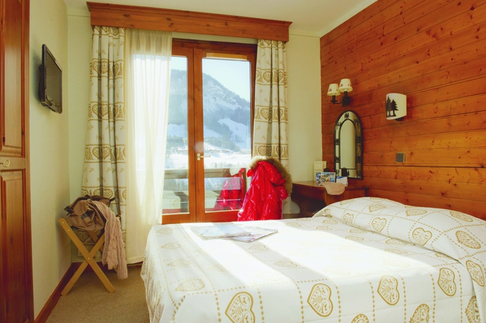 Imagen de la habitación del Hotel Vacances Bleues Les Chalets Du Prariand. Foto 12