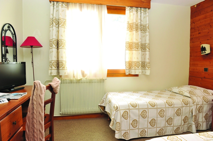 Imagen de la habitación del Hotel Vacances Bleues Les Chalets Du Prariand. Foto 13