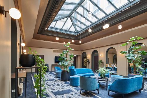 Imagen de los interiores del Hotel Vacances Bleues Provinces Opera. Foto 10