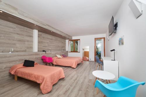 Imagen de la habitación del Hotel Vacanze 2000 - Adults Only. Foto 7