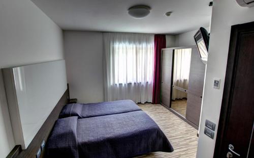 Imagen de la habitación del Hotel Vacanze 2000 - Adults Only. Foto 9