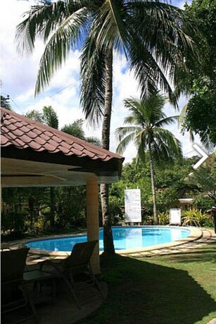 Imagen de la piscina del Hotel Vacation Villas At Subic Homes. Foto 32