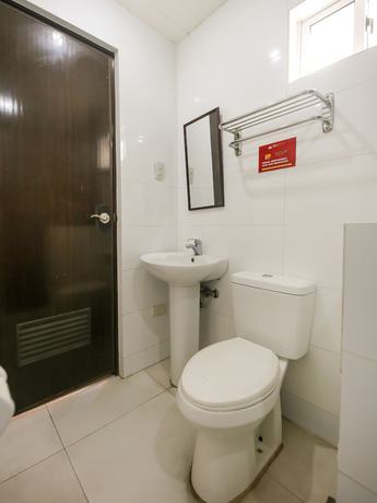 Imagen de la habitación del Hotel Vaccinated Staff - OYO 850 Clr Mn Inn. Foto 4