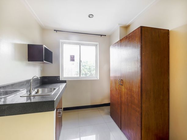 Imagen de la habitación del Hotel Vaccinated Staff - OYO 850 Clr Mn Inn. Foto 13