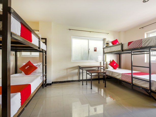 Imagen de la habitación del Hotel Vaccinated Staff - OYO 850 Clr Mn Inn. Foto 15