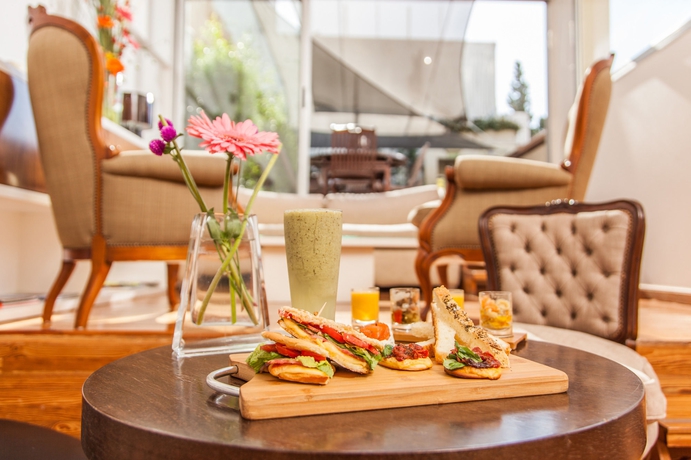 Imagen del bar/restaurante del Hotel Vain Boutique. Foto 2