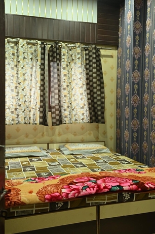 Imagen de la habitación del Hotel Vaishnavi Paying Guest House. Foto 11