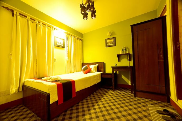 Imagen de la habitación del Hotel Vajra Guest House and Restaurant. Foto 16