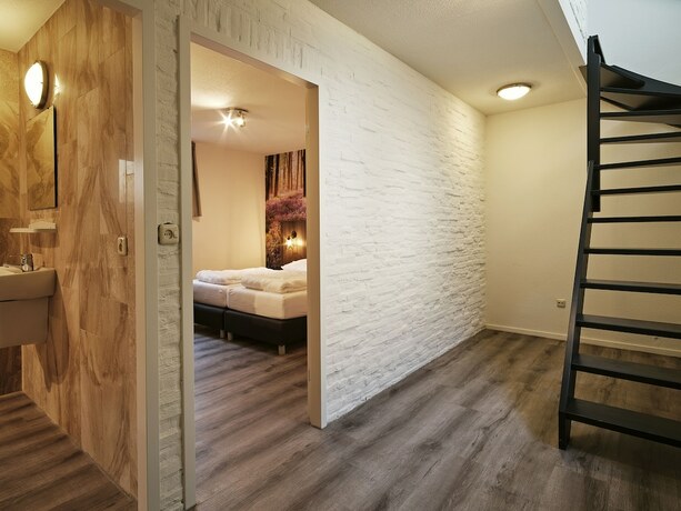 Imagen de la habitación del Hotel Vakantiepark De Bosrand. Foto 19