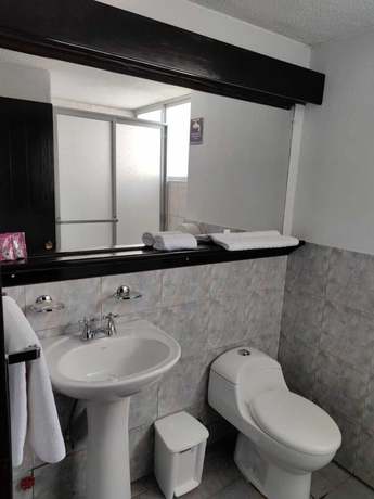 Imagen de la habitación del Hotel Val Santamaria Quito. Foto 8
