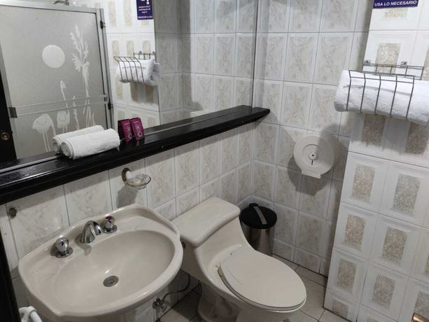 Imagen de la habitación del Hotel Val Santamaria Quito. Foto 14