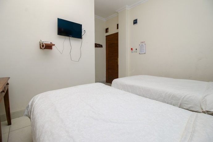 Imagen de la habitación del Hotel Vala Malioboro. Foto 14