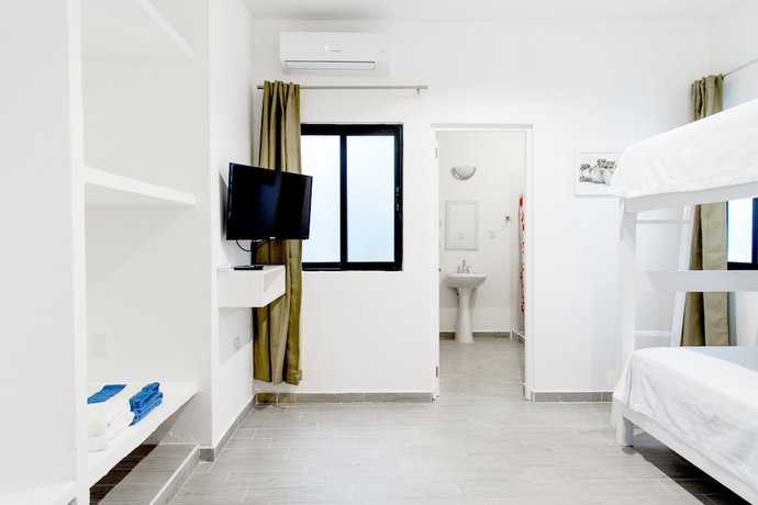 Imagen de la habitación del Hotel Valentina Suites by Las Flores. Foto 13