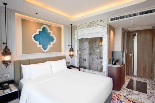 Imagen de la habitación del Hotel Valia Hotel Bangkok. Foto 11