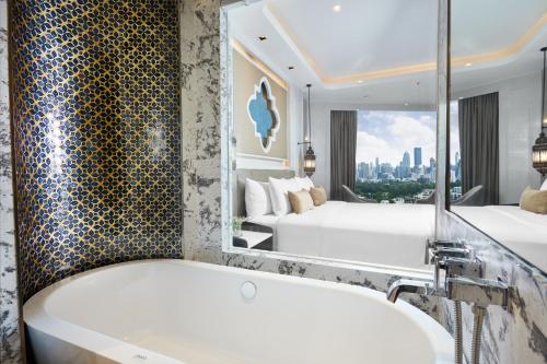 Imagen de la habitación del Hotel Valia Hotel Bangkok. Foto 12