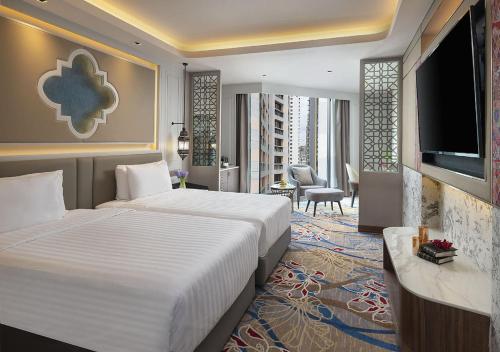 Imagen de la habitación del Hotel Valia Hotel Bangkok. Foto 15