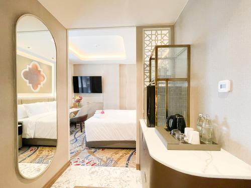 Imagen de la habitación del Hotel Valia Hotel Bangkok. Foto 16