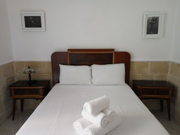 Imagen de la habitación del Hotel Vallettastay Standard Apartments. Foto 16