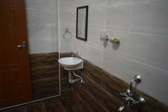 Imagen de la habitación del Hotel Valluvar. Foto 11