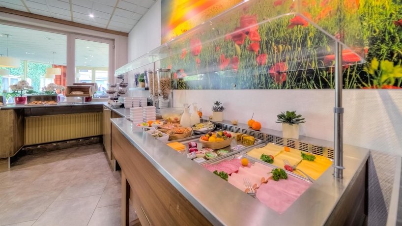 Imagen del bar/restaurante del Hotel Value Stay Menen. Foto 8