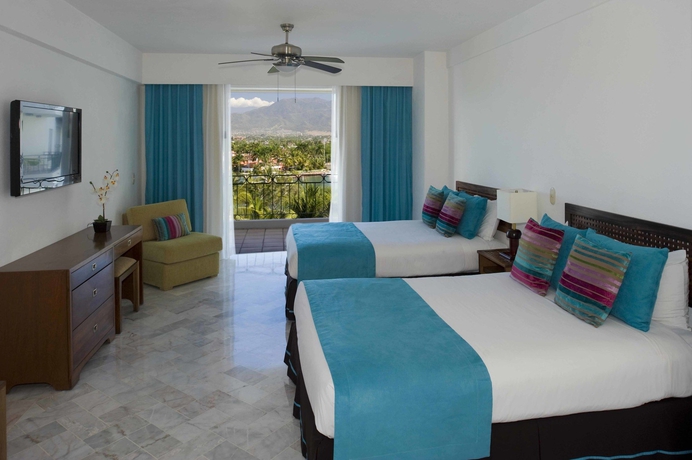 Imagen de la habitación del Hotel Vamar Vallarta All Inclusive Marina and Beach Resort. Foto 9
