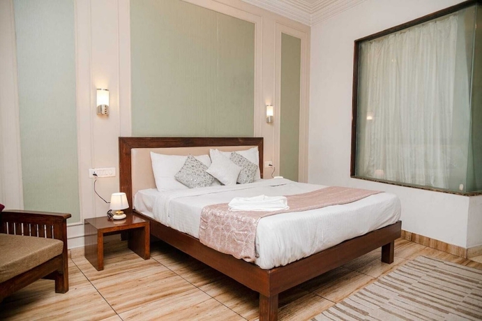 Imagen de la habitación del Hotel Vamsor Heights. Foto 2