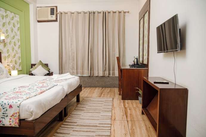 Imagen de la habitación del Hotel Vamsor Heights. Foto 3