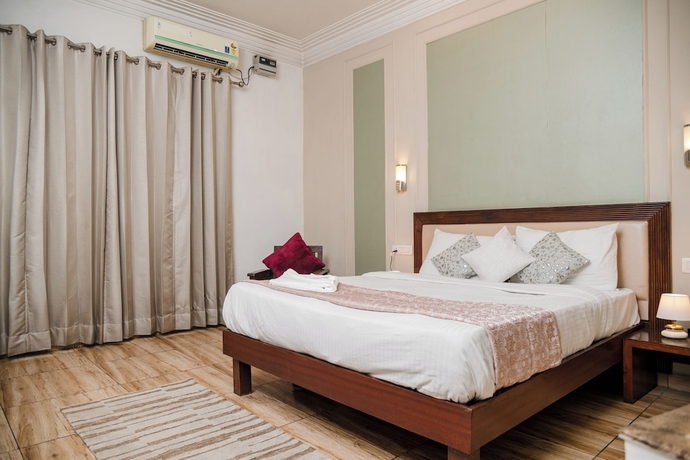 Imagen de la habitación del Hotel Vamsor Heights. Foto 10