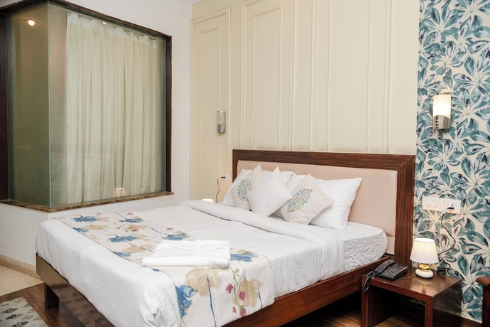 Imagen de la habitación del Hotel Vamsor Heights. Foto 11