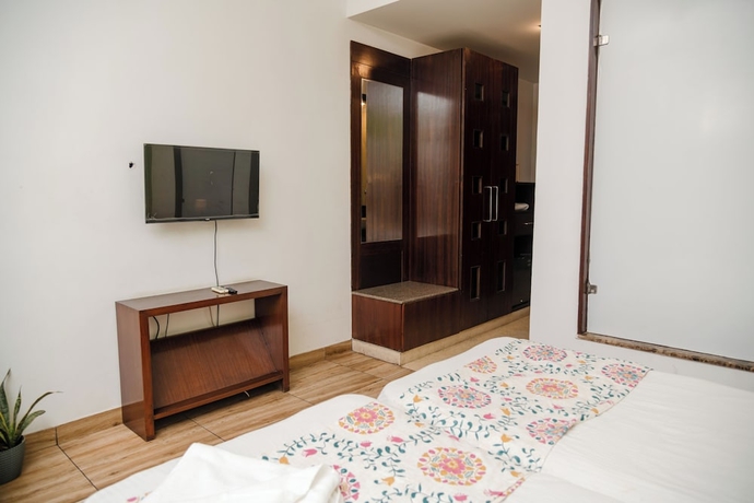 Imagen de la habitación del Hotel Vamsor Heights. Foto 12