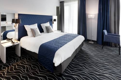 Imagen de la habitación del Hotel Van Der Valk Mons Congres. Foto 9