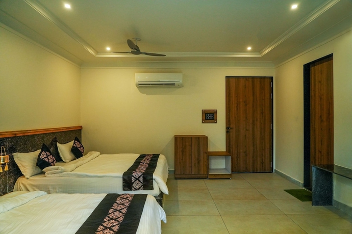 Imagen de la habitación del Hotel Van Vihar Farm and Resort. Foto 6