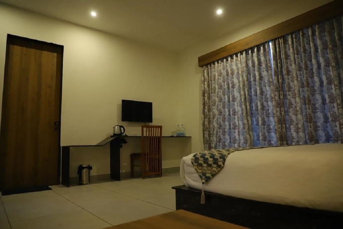 Imagen de la habitación del Hotel Van Vihar Farm and Resort. Foto 11