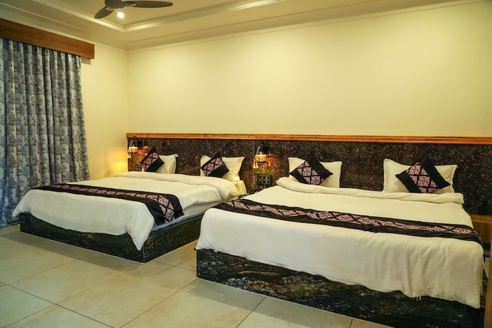 Imagen de la habitación del Hotel Van Vihar Farm and Resort. Foto 16