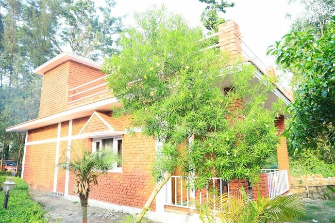 Imagen de la habitación del Hotel Vanasthali Jungle Resort Jim Corbett. Foto 16