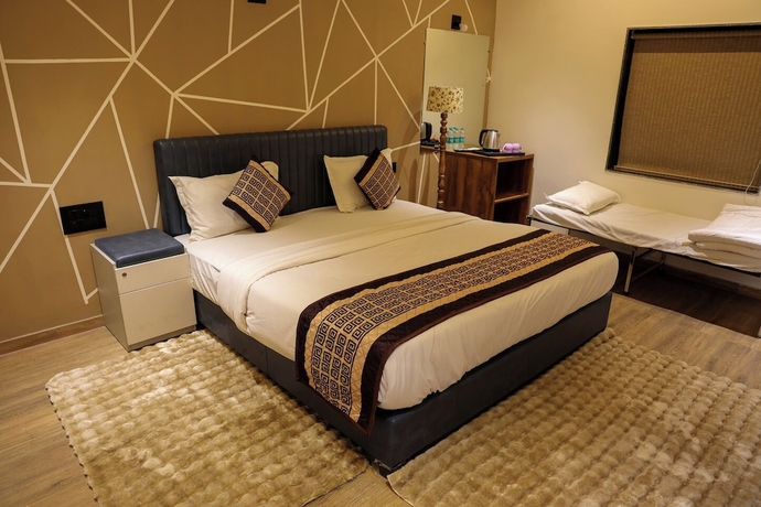 Imagen de la habitación del Hotel Vanbhoomi Resort. Foto 9