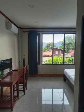 Imagen de la habitación del Hotel Vang Vieng Champa. Foto 16