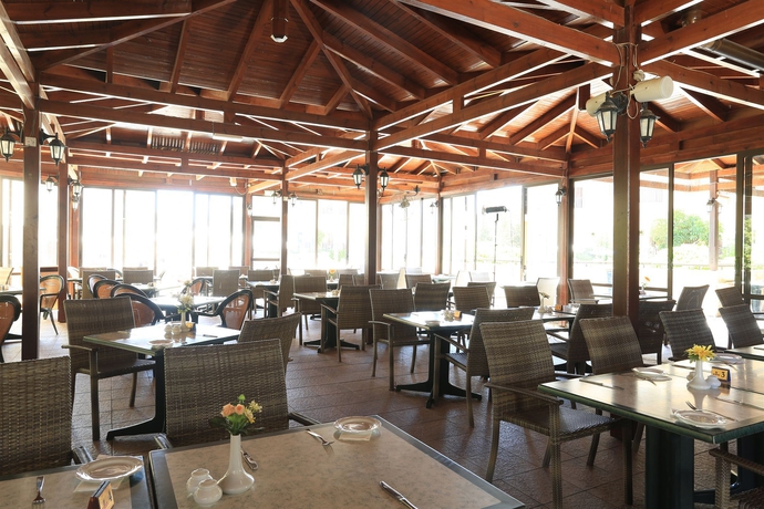 Imagen del bar/restaurante del Hotel Vangelis Hotel and Suites. Foto 2