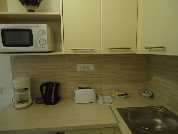 Imagen de la habitación del Hotel Vangelis Villas. Foto 17