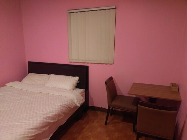 Imagen de la habitación del Hotel Vanilla Inn. Foto 17