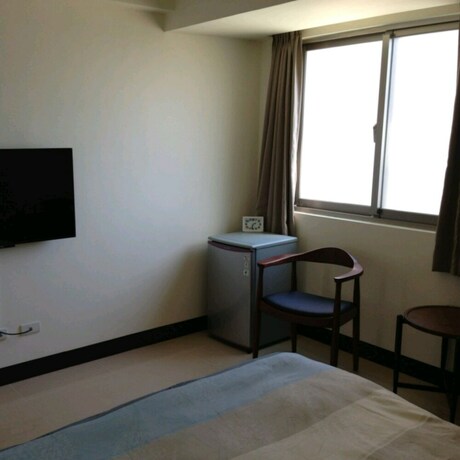 Imagen de la habitación del Hotel Vanilla Inn. Foto 28