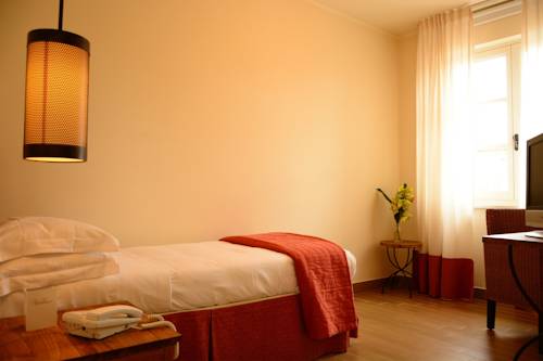 Imagen de la habitación del Hotel Vannucci. Foto 10