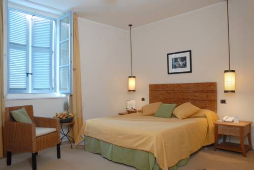 Imagen de la habitación del Hotel Vannucci. Foto 12