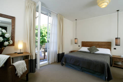 Imagen de la habitación del Hotel Vannucci. Foto 13