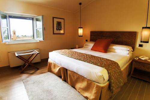 Imagen de la habitación del Hotel Vannucci. Foto 15