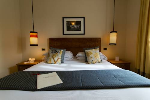 Imagen de la habitación del Hotel Vannucci. Foto 16